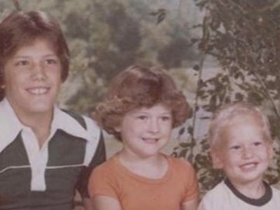 Blake, Ritchie, and Endy Shelton are all sitting next to each other for the picture.